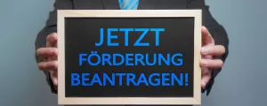 Schild "Jetzt Förderung beantragen"