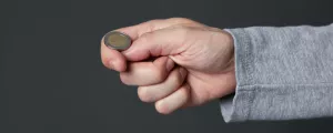 Euro-Münze auf einer Hand