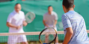 Tennisspieler beim Doppel