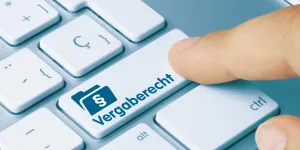 Vergaberecht - Wort auf blauen taste.