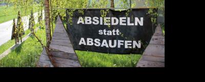 Tafel "Absiedeln statt absaufen"