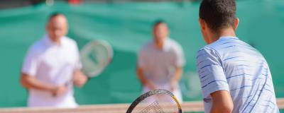 Tennisspieler beim Doppel