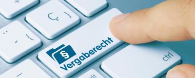 Vergaberecht - Wort auf blauen taste.