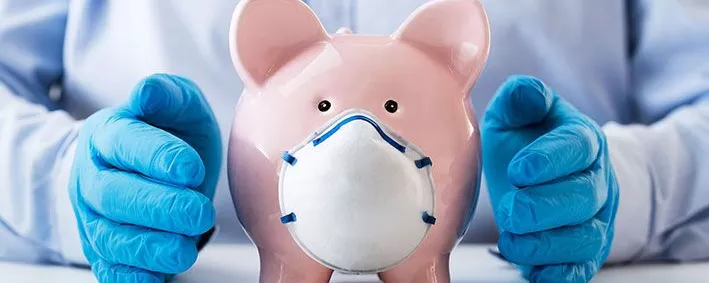 Sparschwein mit Mund-Nasen-Schutz