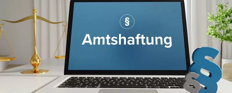 Laptop auf dem das Wort Amtshaftung steht