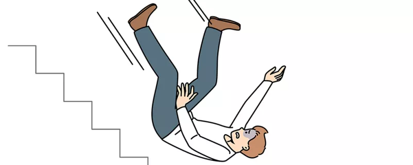 Mann stürzt von einer Treppe