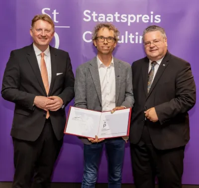 Roland Weinert (BMWET), Johann Wagner für den Preisträger IKK Group GmbH, Rainer Gagstädter (ACA).