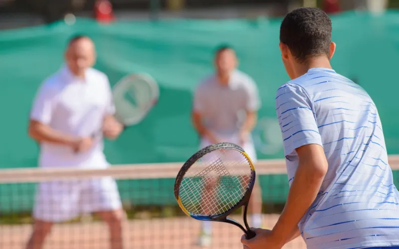 Tennisspieler beim Doppel